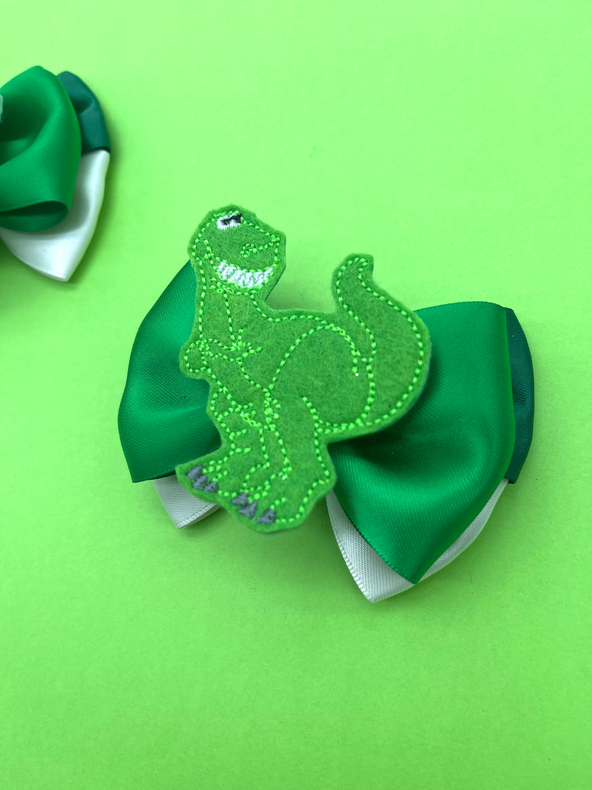 Mini Dinosaur Inspired Bow